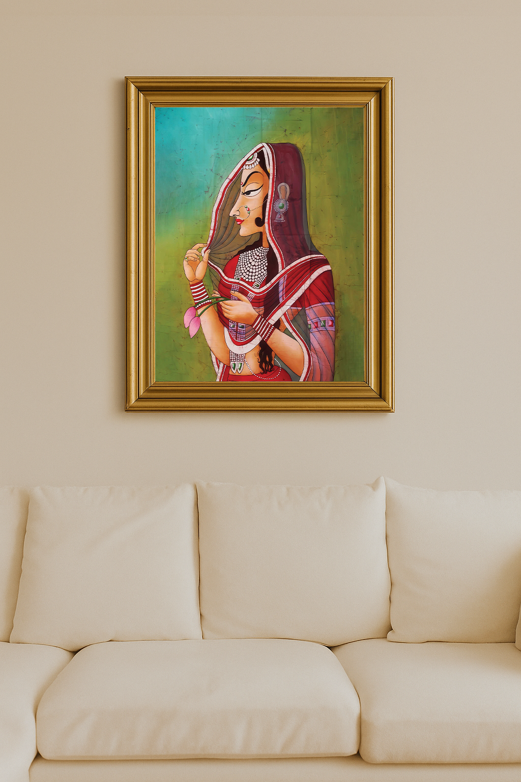 Traditional Indian woman in red saree holding lotus flowers, eyes closed in contemplation against a green background.