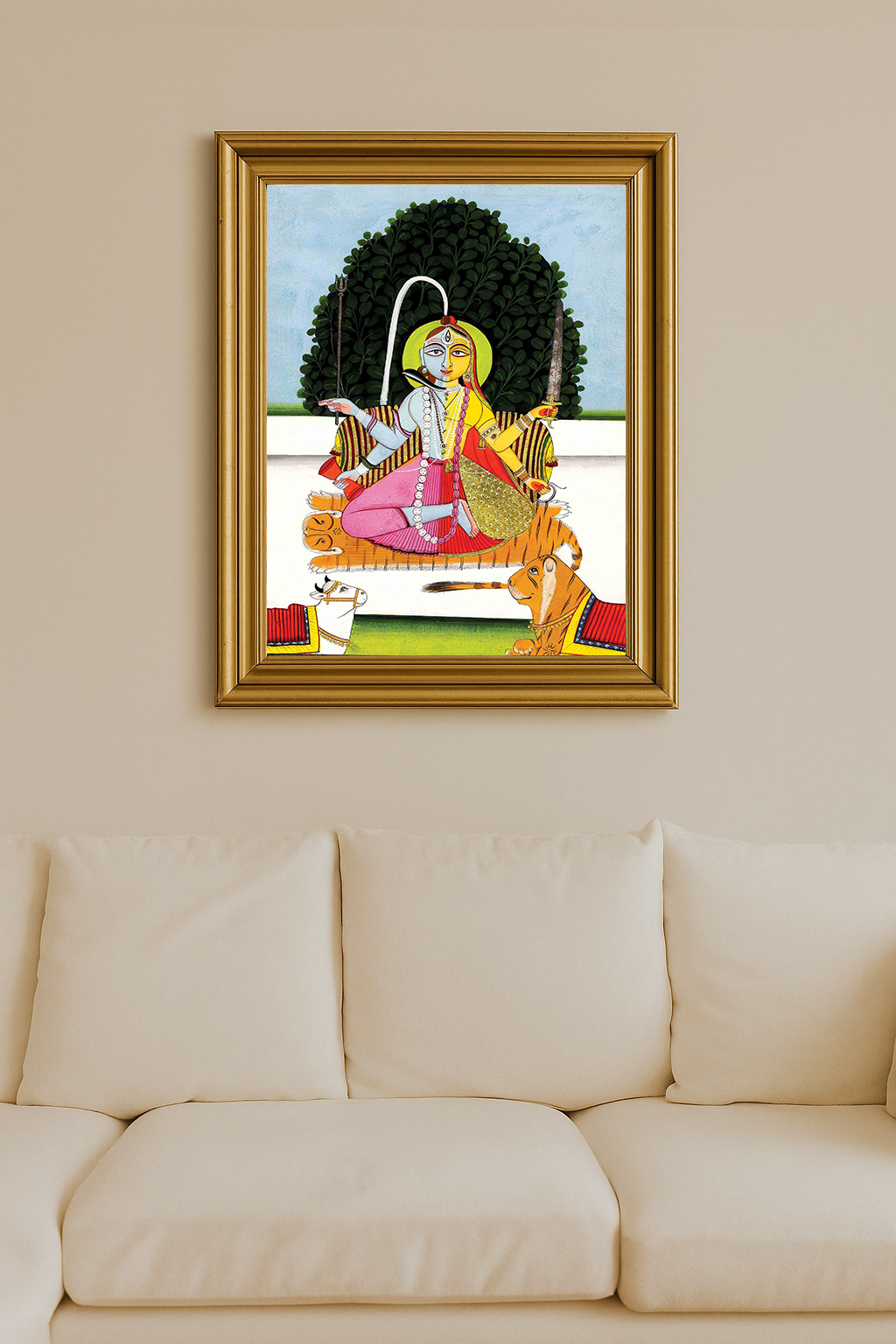 A traditional Indian painting of Ardhanari, the half-male half-female deity, seated on a tiger skin with a bull and lion below.