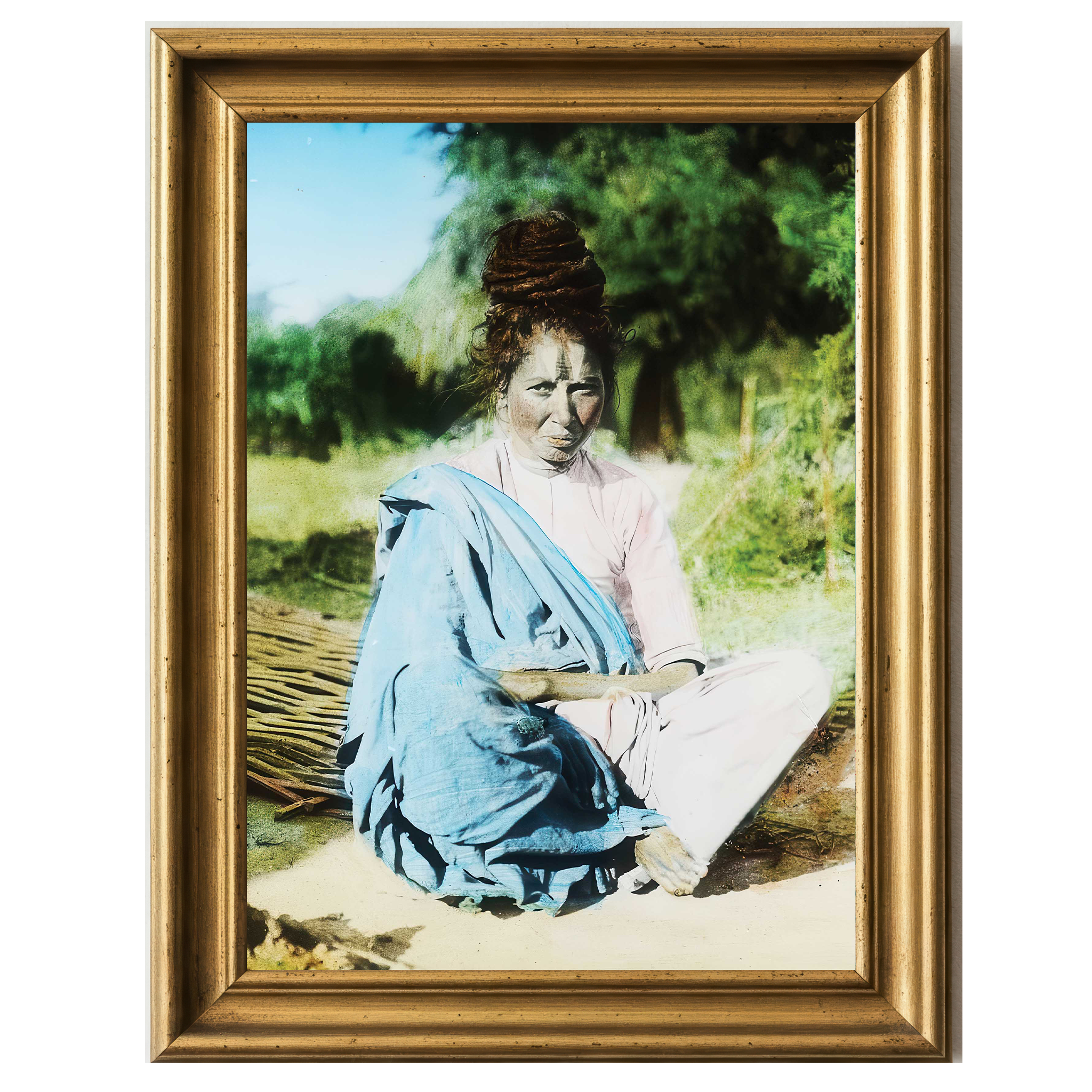 Mystic woman seated on the ground in Chanpatia, India, early 1900s