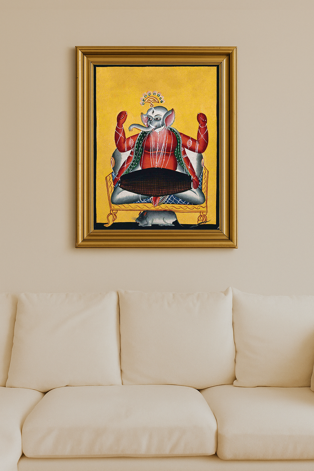 Red-skinned Lord Ganesha playing a dhola drum, seated on a yellow background.